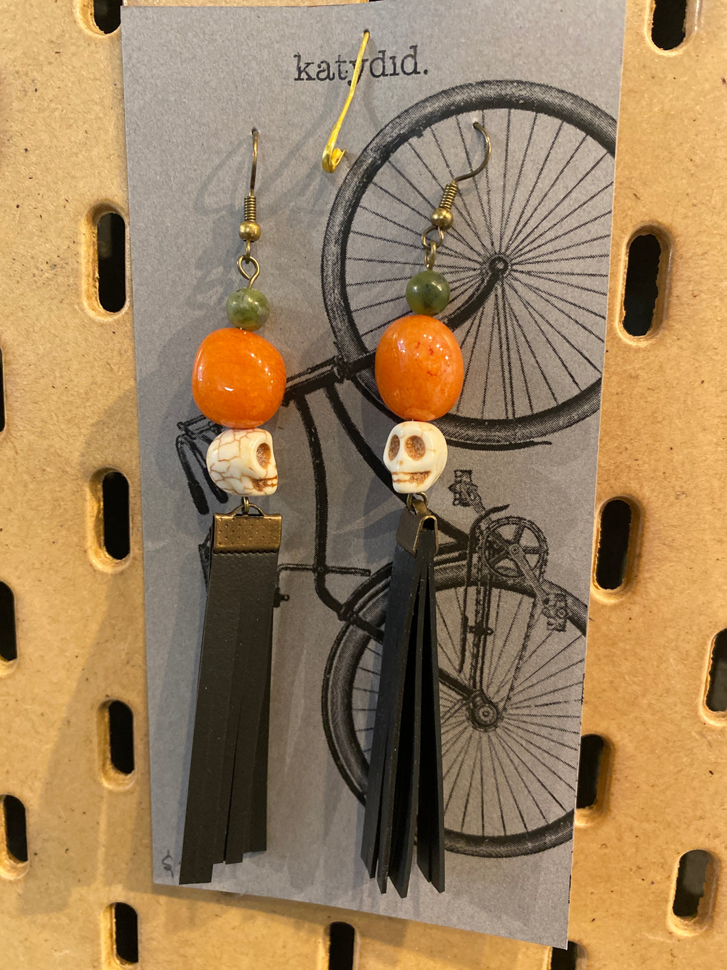 K22 Katydid recycled bike tube earrings with skulls, orange & green stones